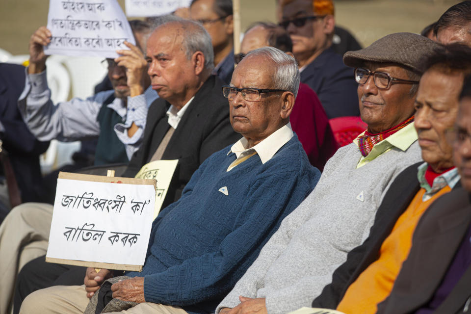 Retired college teachers participate in a protest against the Citizenship Amendment Act in Gauhati, India, Friday, Dec. 27, 2019. Tens of thousands of protesters have taken to India's streets to call for the revocation of the law, which critics say is the latest effort by Narendra Modi's government to marginalize the country's 200 million Muslims. (AP Photo/Anupam Nath)