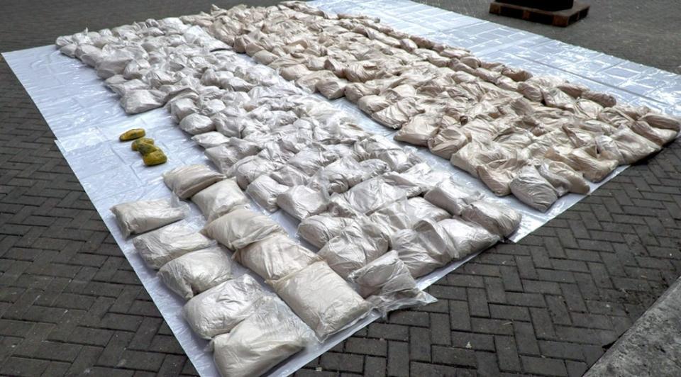 A haul of heroin that was hidden inside bags of rice seized from a container ship at the port of Felixstowe (National Crime Agency) (PA Archive)