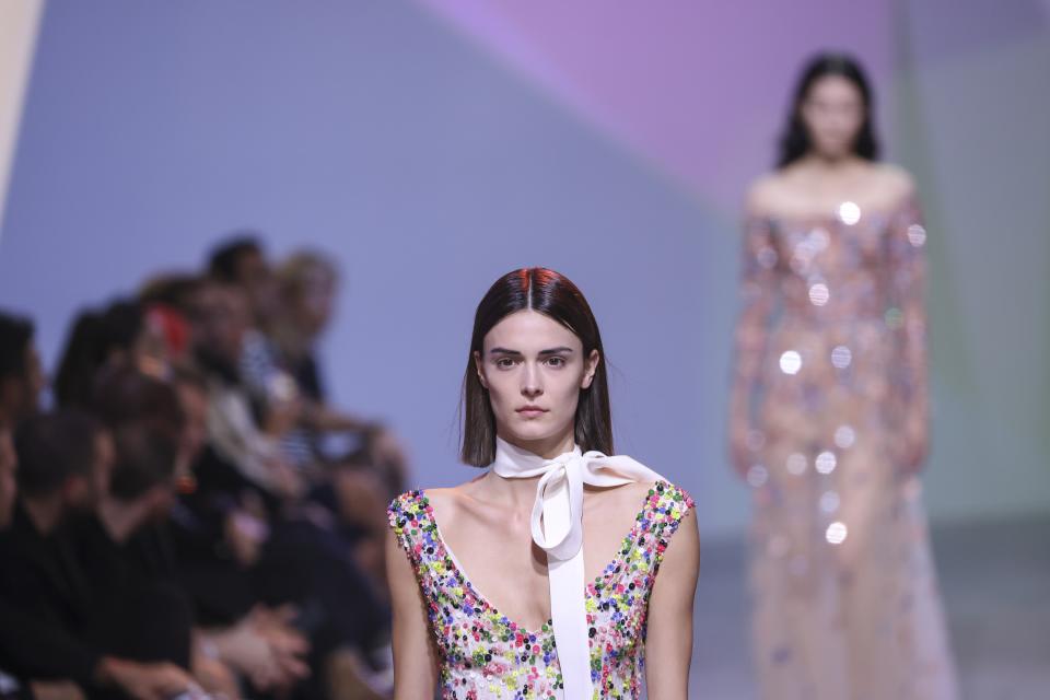 A model wears a creation for the Elie Saab ready-to-wear Spring/Summer 2023 fashion collection presented Saturday, Oct. 1, 2022 in Paris. (Photo by Vianney Le Caer/Invision/AP)
