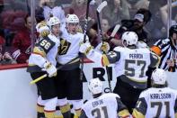 Oct 7, 2017; Glendale, AZ, USA; Vegas Golden Knights defenseman Nate Schmidt (88) celebrates with left wing Erik Haula (56) and left wing David Perron (57) and center Cody Eakin (21) and center William Karlsson (71) after scoring a goal in the third period against the Arizona Coyotes at Gila River Arena. Mandatory Credit: Matt Kartozian-USA TODAY Sports