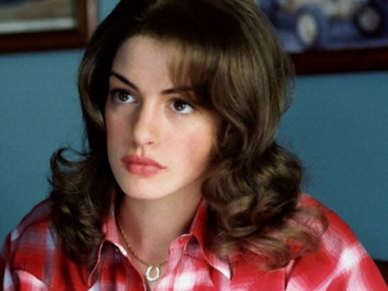 ane hathaway in brokeback mountain wearing a red shirt