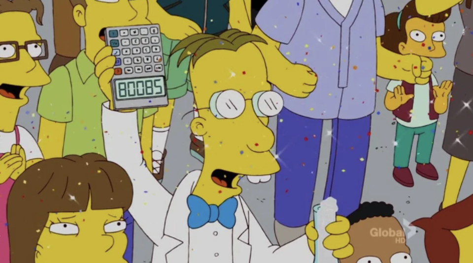 Professor Frink stands in a crowd, holding up a calculator that reads 80085, or 'boobs'