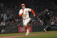 San Francisco Giants' Mike Yastrzemski runs home to score against the Kansas City Royals during the eighth inning of a baseball game in San Francisco, Tuesday, June 14, 2022. (AP Photo/Jeff Chiu)