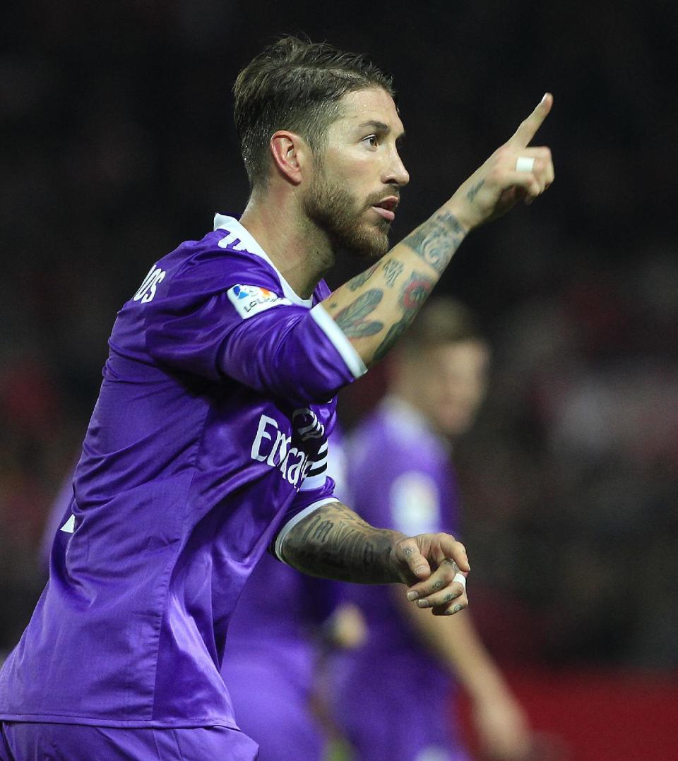 Real Madrid's Sergio Ramos celebrates after scoring against Sevilla during a Spain's King's Cup soccer match between Real Madrid and Sevilla at the Ramon Sanchez Pizjuan stadium, in Seville, Spain on Thursday, Jan. 12, 2017. (AP Photo/Angel Fernandez)