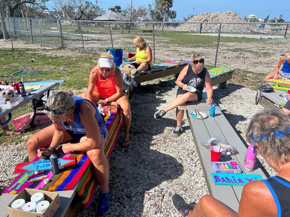 The volunteers of the Ryan & Katrena Crew have been replacing the Fort Myers Beach street signs lost to Hurricane Ian. They meet every Saturday to make their colorful, handmade signs.
