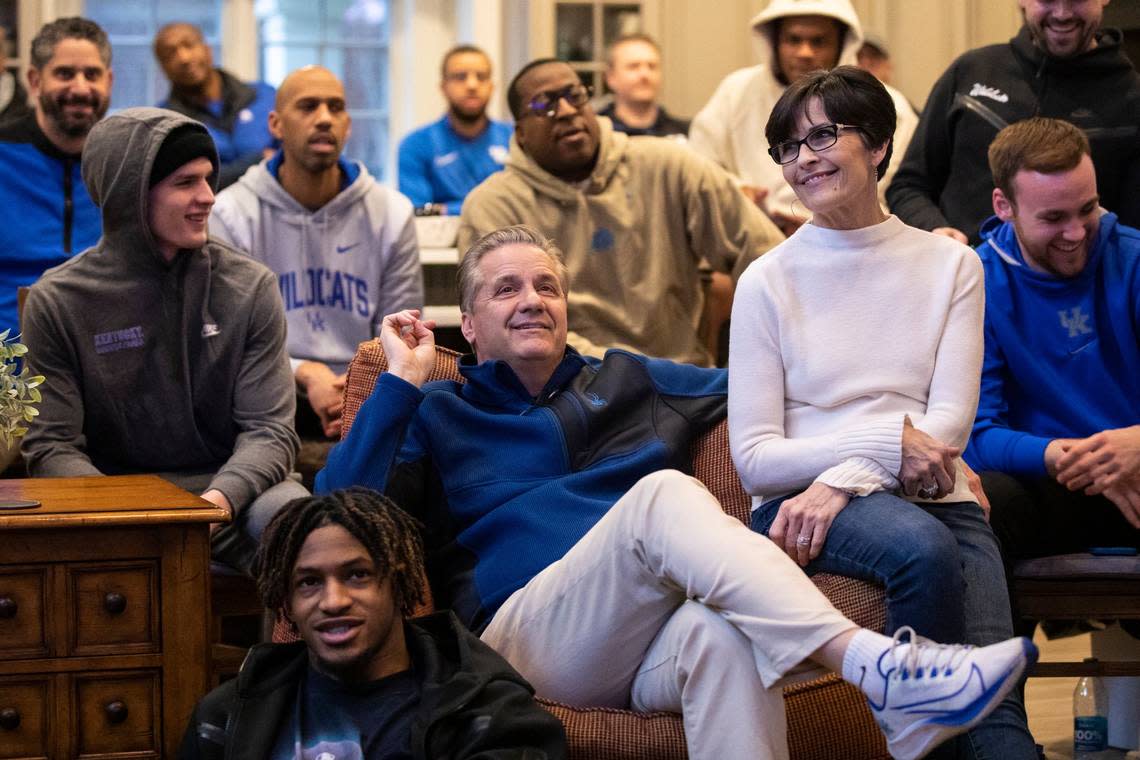 Kentucky Wildcats head coach John Calipari waits with his wife, Ellen, and the team to find out their ranking and opponent for the NCAA Men’s Basketball tournament the Calipari’s home in Lexington, Ky., Sunday, March 12, 2023.
