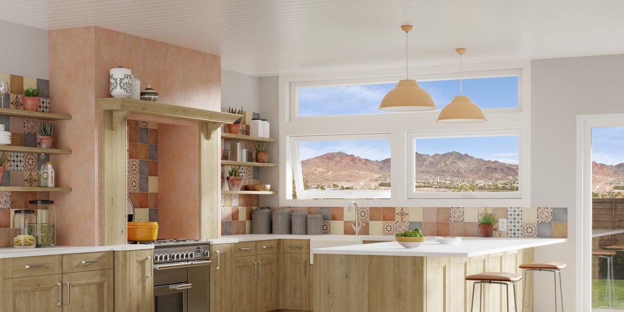 windows looking over a view of mountains from a kitchen