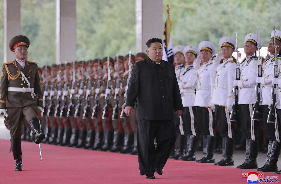 This Sunday, Sept. 10, 2023, photo provided by the North Korean government, shows that North Korea leader Kim Jong Un greets attendants in Pyongyang, North Korea, before boarding on a train to Russia. Independent journalists were not given access to cover the event depicted in this image distributed by the North Korean government. The content of this image is as provided and cannot be independently verified. Korean language watermark on image as provided by source reads: "KCNA" which is the abbreviation for Korean Central News Agency. (Korean Central News Agency/Korea News Service via AP)