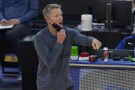 Golden State Warriors coach Steve Kerr gestures during the first half of the team's NBA basketball game against the Indiana Pacers in San Francisco, Tuesday, Jan. 12, 2021. (AP Photo/Jeff Chiu)