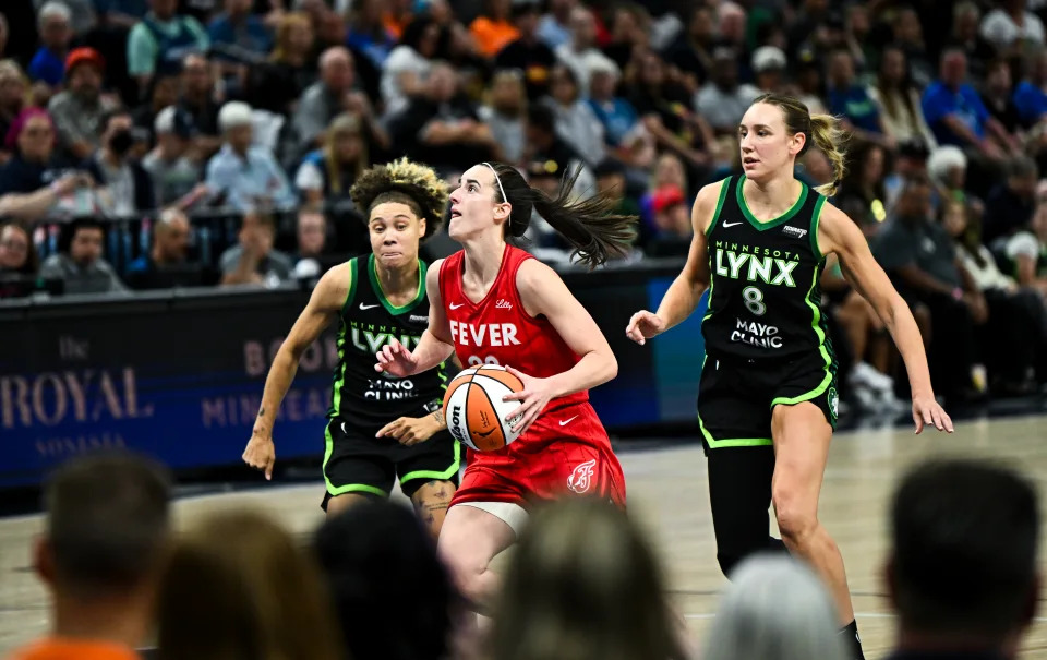 MINNEAPOLIS, MINNESOTA - AUGUST 24: Caitlin Clark #22 of the Indiana Fever drives with the ball in the second quarter of the game against the Minnesota Lynx at Target Center on August 24, 2024 in Minneapolis, Minnesota. NOTE TO USER: User expressly acknowledges and agrees that, by downloading and or using this photograph, User is consenting to the terms and conditions of the Getty Images License Agreement. (Photo by Stephen Maturen/Getty Images)