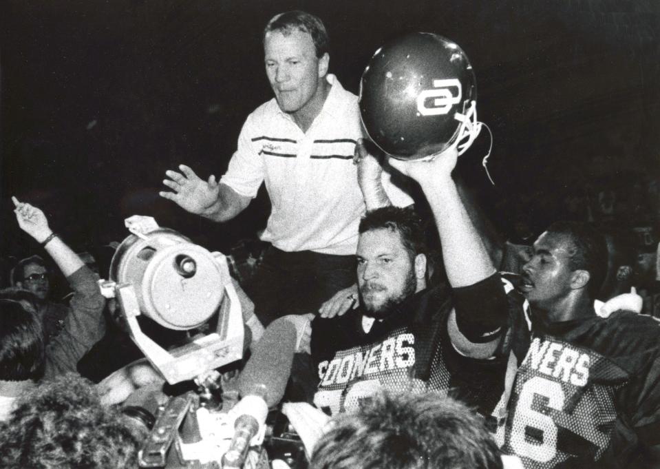 Sooners coach Barry Switzer and his team celebrate their 1985 national championship at the Orange Bowl.