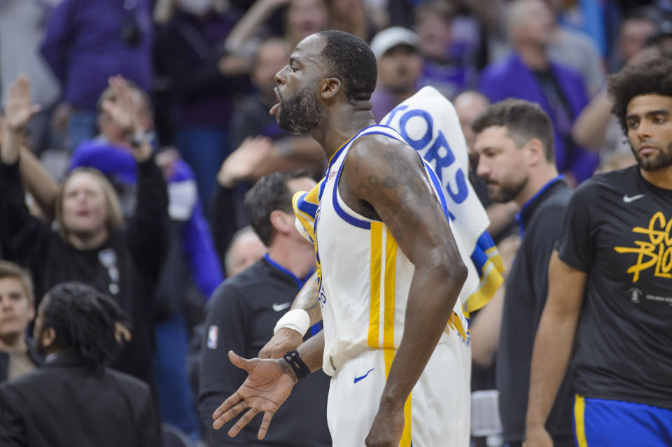 Golden State Warriors forward Draymond Green shouts at the crowd as he is ejected from the game during the second half of Game 2 in the first round of the NBA basketball playoffs against the Sacramento Kings in Sacramento, Calif., Monday, April 17, 2023. The Kings won 114-106. (AP Photo/Randall Benton)