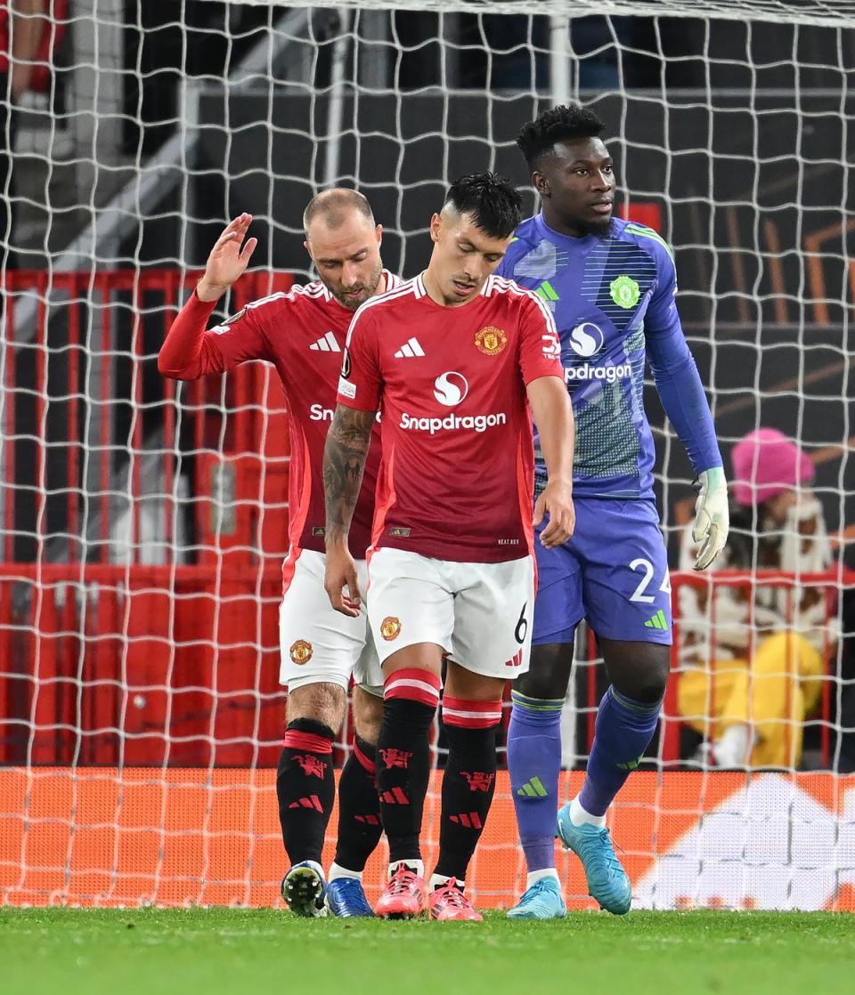 Christian Eriksen, Lisandro Martinez and Andre Onana look dejected after FC Twente’s equaliser on Wednesday (Getty)