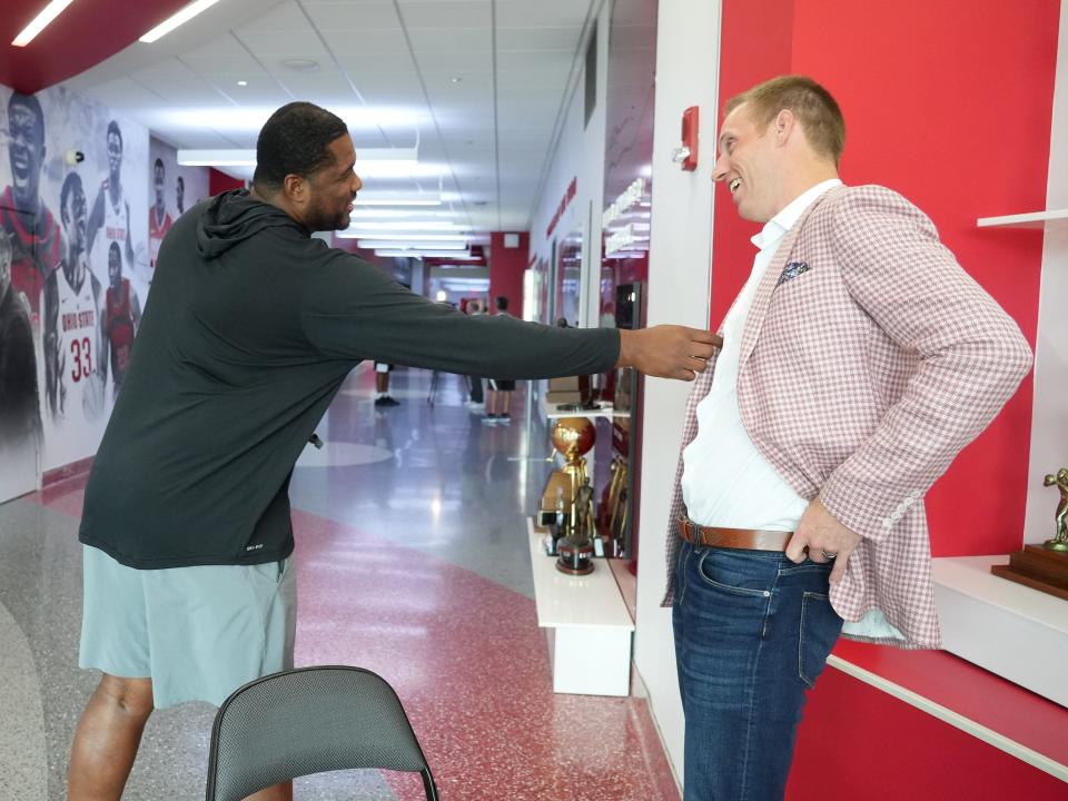 Jul 24, 2023; Columbus, Ohio. Former Ohio State men's basketball player Matt Terwilliger and former player and current basketball staff member Terrance Dials joke around in lobby of the Schottenstein Center. Since leaving basketball, Terwilliger is running his own wealth advisory company. 