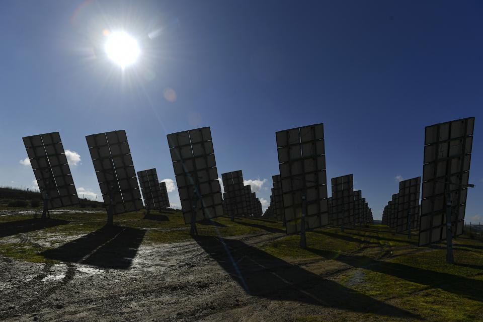 Solar panels work in Los Arcos, Navarra Province, northern Spain, Friday, Feb. 24, 2023. Spain is building on its reputation in renewable energy to position itself as Europe's future leader in green hydrogen. But some energy sector experts express caution over ramping up an industry that would be wholly reliant on massive increases in the availability of zero-carbon electricity made from sources like wind or solar. (AP Photo/Alvaro Barrientos)