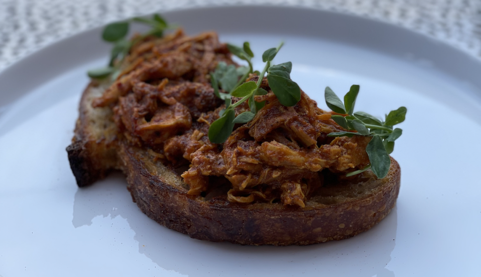 The Coconut Curry Chicken Tartine at Stable Hand.