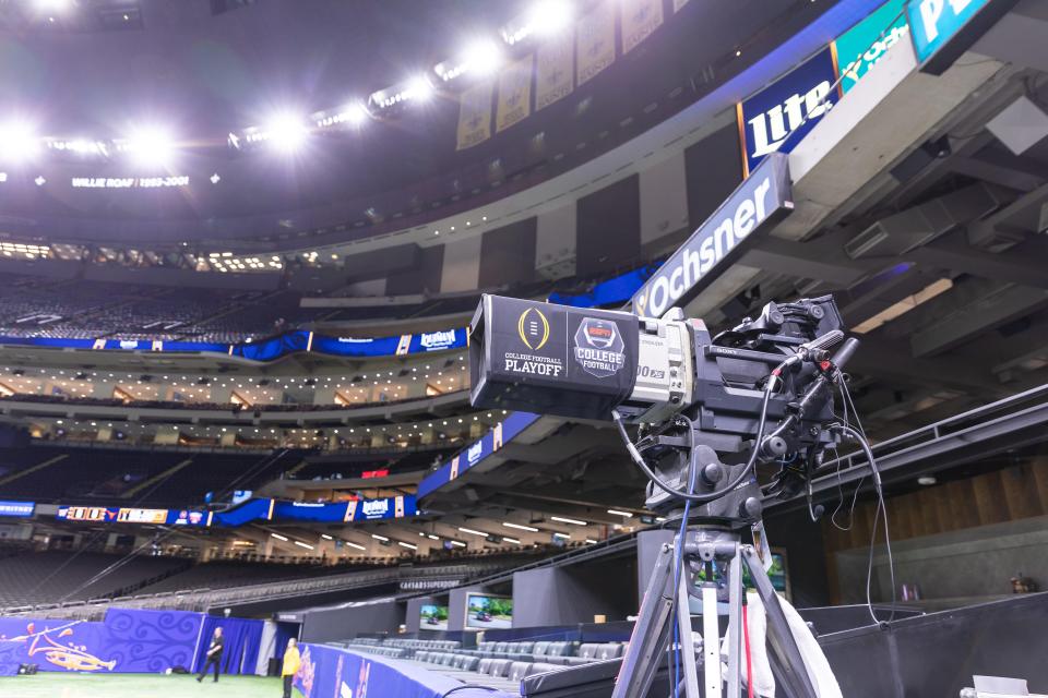 A general view of an ESPN television camera with the College Football Playoff logo before the 2024 Sugar Bowl college football playoff semifinal game between the Texas Longhorns and the Washington Huskies at Caesars Superdome.