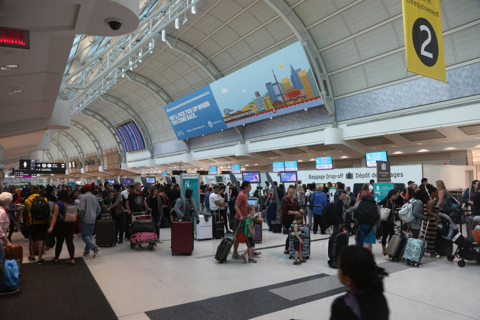 Passengers check in for flights at Lester B. Pearson International Airport in Mississauga, Ontario, Canada. Pearson International Airport is Canada’s largest and busiest airport. (Photo by Creative Touch Imaging Ltd./NurPhoto via Getty Images)