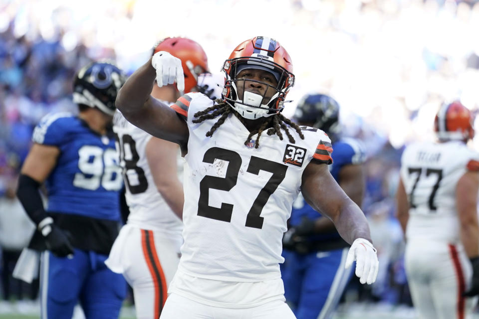 Cleveland Browns running back Kareem Hunt (27) celebrates after a 2-yard touchdown run during the first half of an NFL football game against the Indianapolis Colts, Sunday, Oct. 22, 2023, in Indianapolis. (AP Photo/Michael Conroy)