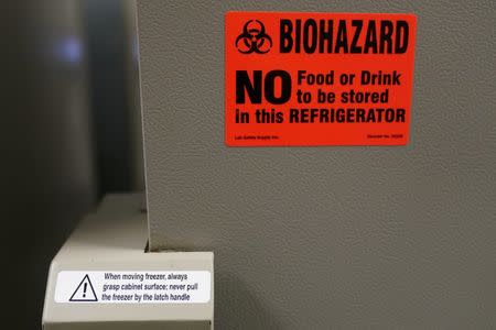 A sign is pictured on a freezer that contains human brains at a brain bank in the Bronx borough of New York City, New York, U.S. June 28, 2017. REUTERS/Carlo Allegri