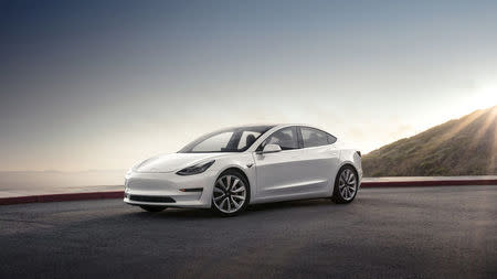 A Tesla Model 3 sedan is seen in this undated handout image as the car company handed over its first 30 Model 3 vehicles to employee buyers at the company’s Fremont facility in California, U.S. on July 28, 2017. Tesla/Handout via REUTERS