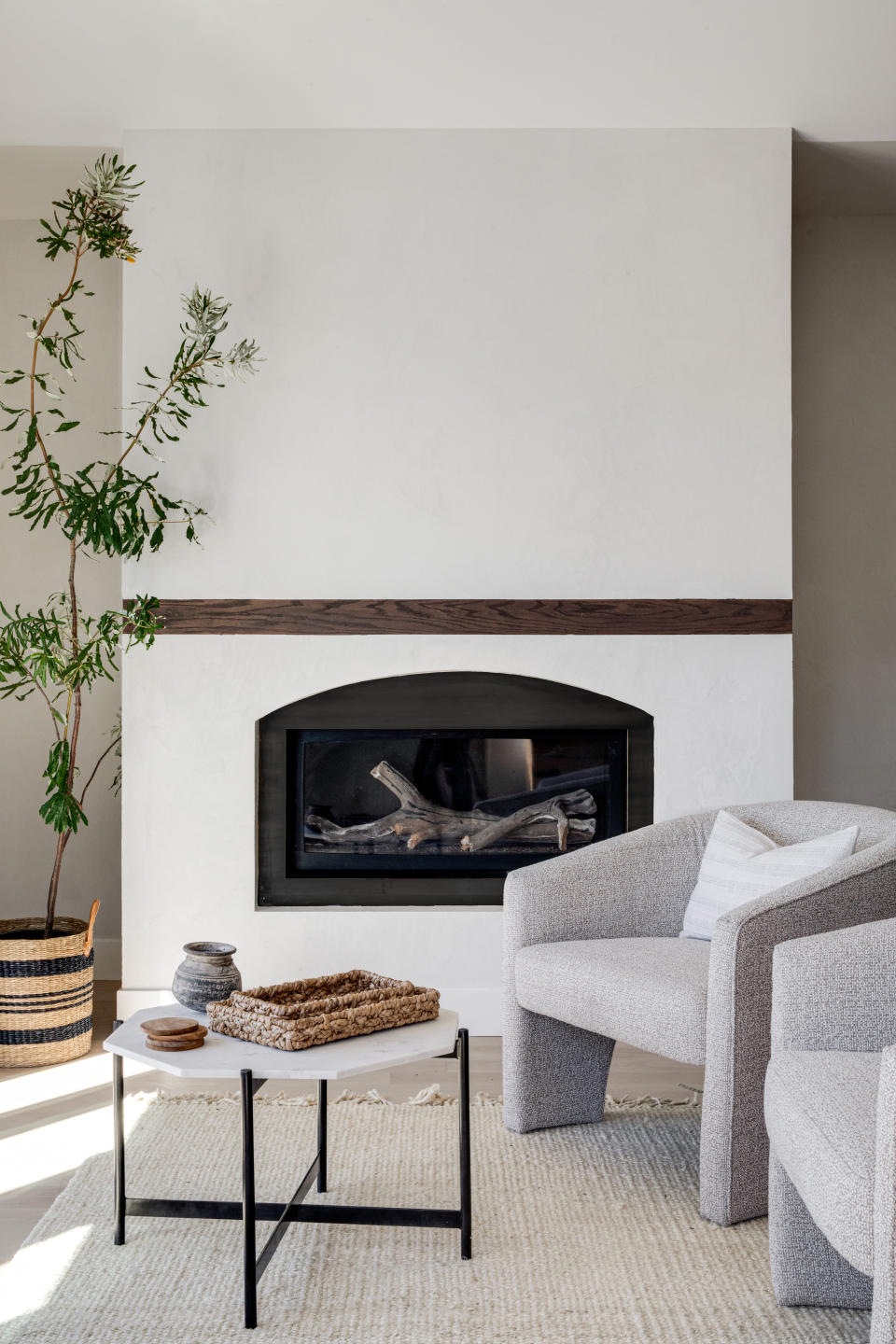 A living room with a fireplace