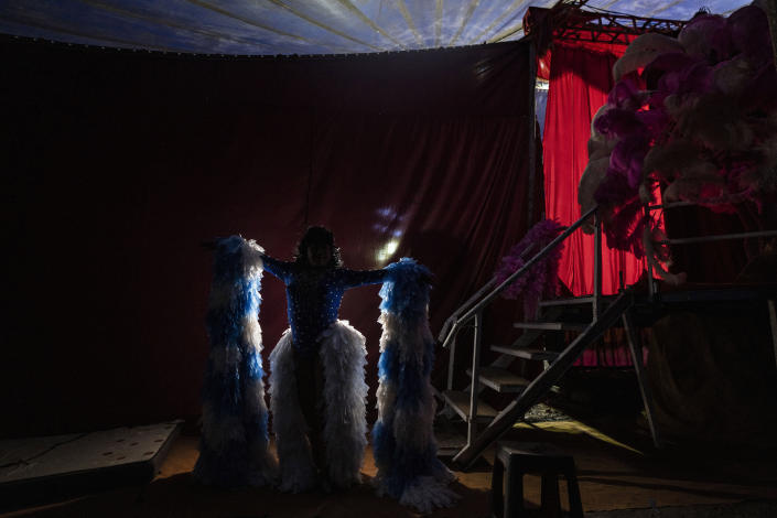 Timoteo Circus performer Arturo Peña, poses for a photo on the outskirts of Santiago, Chile, Saturday, Dec. 10, 2022. Peña, 66, whose transformations includes “La loca de la cartera" or “The Crazy Purse Lady,” is one of the most popular acts of the show that is aimed at an adult audience. (AP Photo/Esteban Felix)