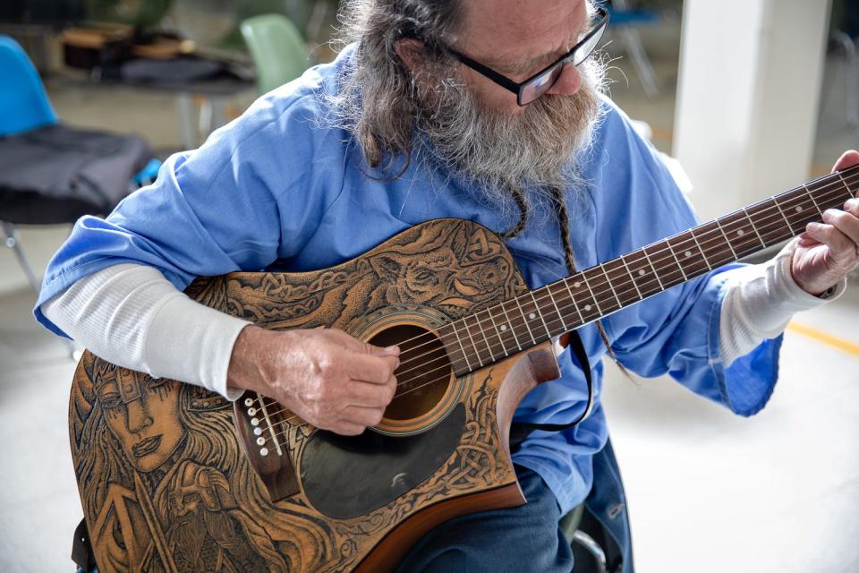 Peter Merts photos show California Prison Arts Programs A classical guitar student at Sierra Conservation Center - 2019