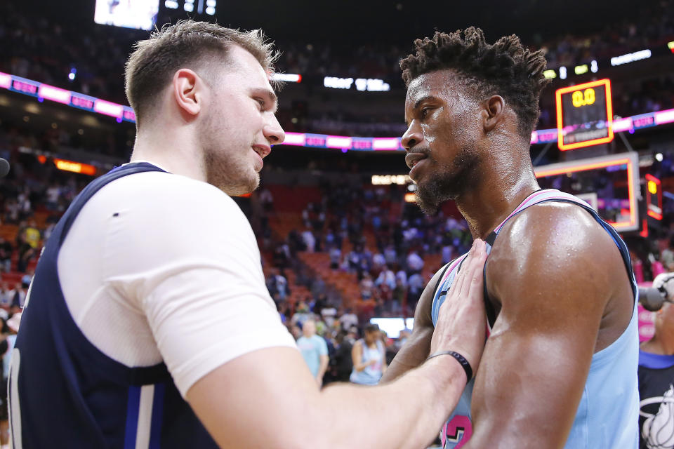 Luka Doncic and Jimmy Butler — a popular preseason MVP pick and last year's Eastern Conference hero — are both in danger of missing the playoffs. (Michael Reaves/Getty Images)