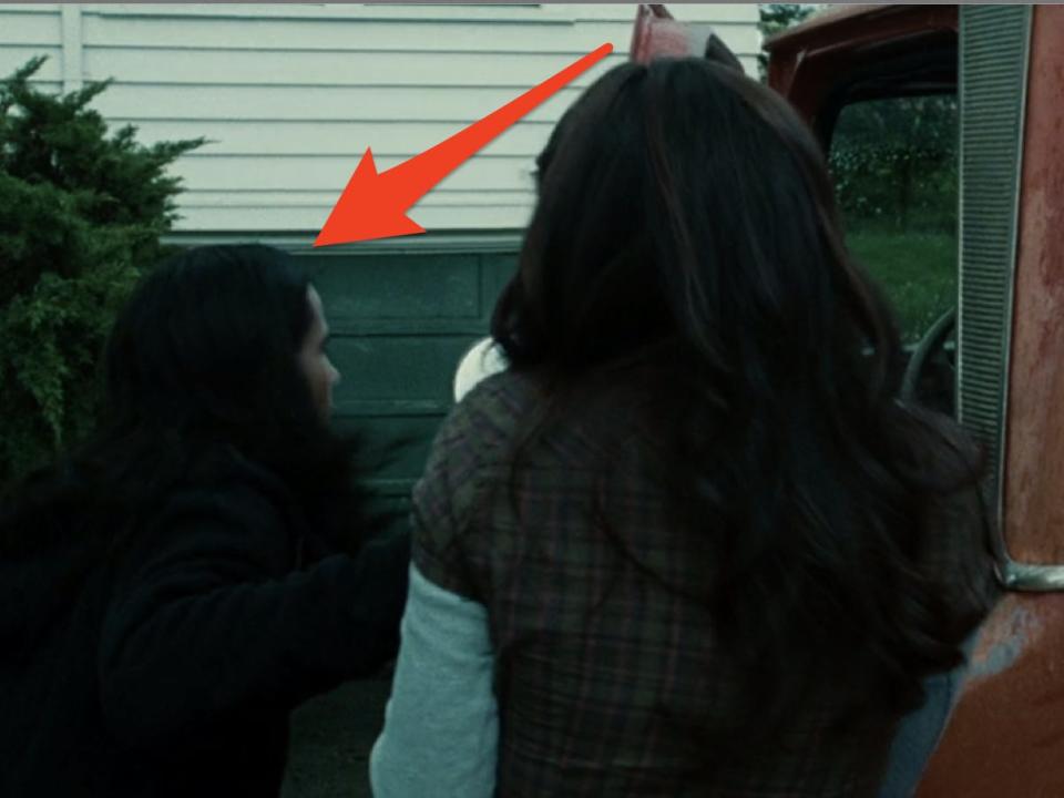Bella hitting jacob with her red truck car door in Twilight