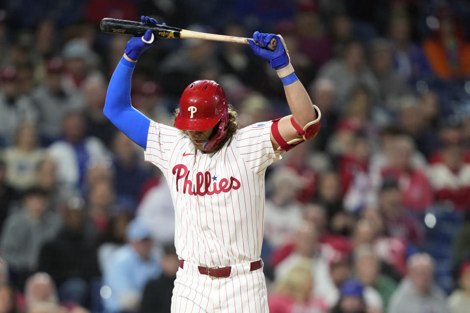 Philadelphia Phillies' Alec Bohm reacts after striking out against Chicago Cubs pitcher Hayden Wesneski during the eighth inning of a baseball game, Tuesday, Sept. 24, 2024, in Philadelphia. (AP Photo/Matt Slocum)