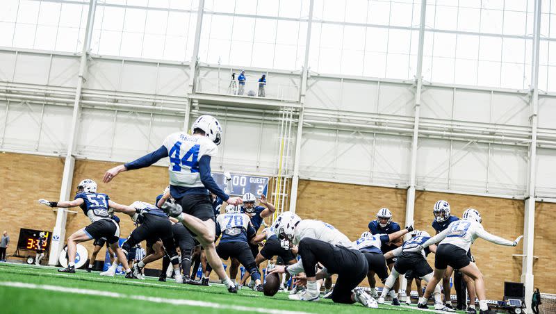 BYU kicker Will Ferrin attempts a field goal during spring practice at BYU’s Indoor Practice Facility in Provo. He is one of three kickers battling for the starter’s spot this spring.