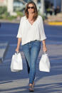 <p>Cindy Crawford looks effortlessly glam in a billowy white top and blue jeans as she grabs dinner to-go on Sunday in Malibu.</p>