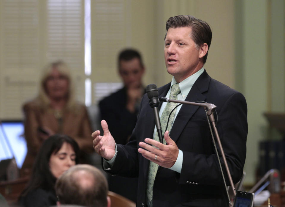 Assemblyman Brian Jones, R-Santee, urges lawmakers to reject a measure to close a corporate tax loophole and used the money for college scholarships, at the Capitol in Sacramento, Calif., Monday, Aug. 13, 2012. Despite Republican opposition, the bill, AB1500, which eliminates a $1 billion tax break for out-of-state corporations and uses the money for college scholarships for families earning between $80,000-$100,000, was approved 54-25 and sent to the Senate. (AP Photo/Rich Pedroncelli)