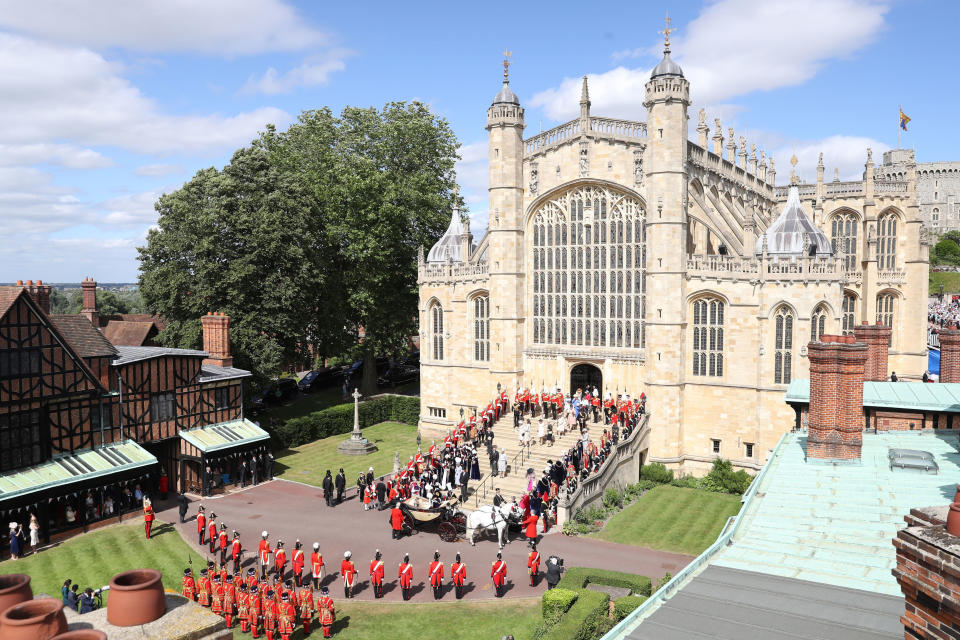 Queen Elizabeth II walks down the steps to her carriage during the annual Order of the Garter Service at St George's Chapel, Windsor Castle.