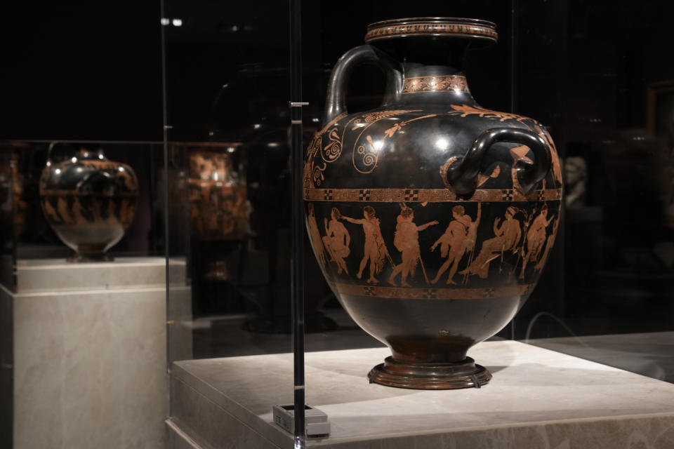 The ancient Greek vase from 420 BC – the Meidias Hydria – on loan from the British Museum, is on display during a media tour ahead of the Greece's Acropolis Museum officially launched of the exhibition, 'Meanings' Personifications and Allegories From Antiquity to Today, in Athens, Tuesday, Dec. 5, 2023. The loan coincides with a spat between the two countries over Greek demands for the return of sculptures from the Parthenon temple on the Acropolis that are housed in the British Museum. (AP Photo/Thanassis Stavrakis)