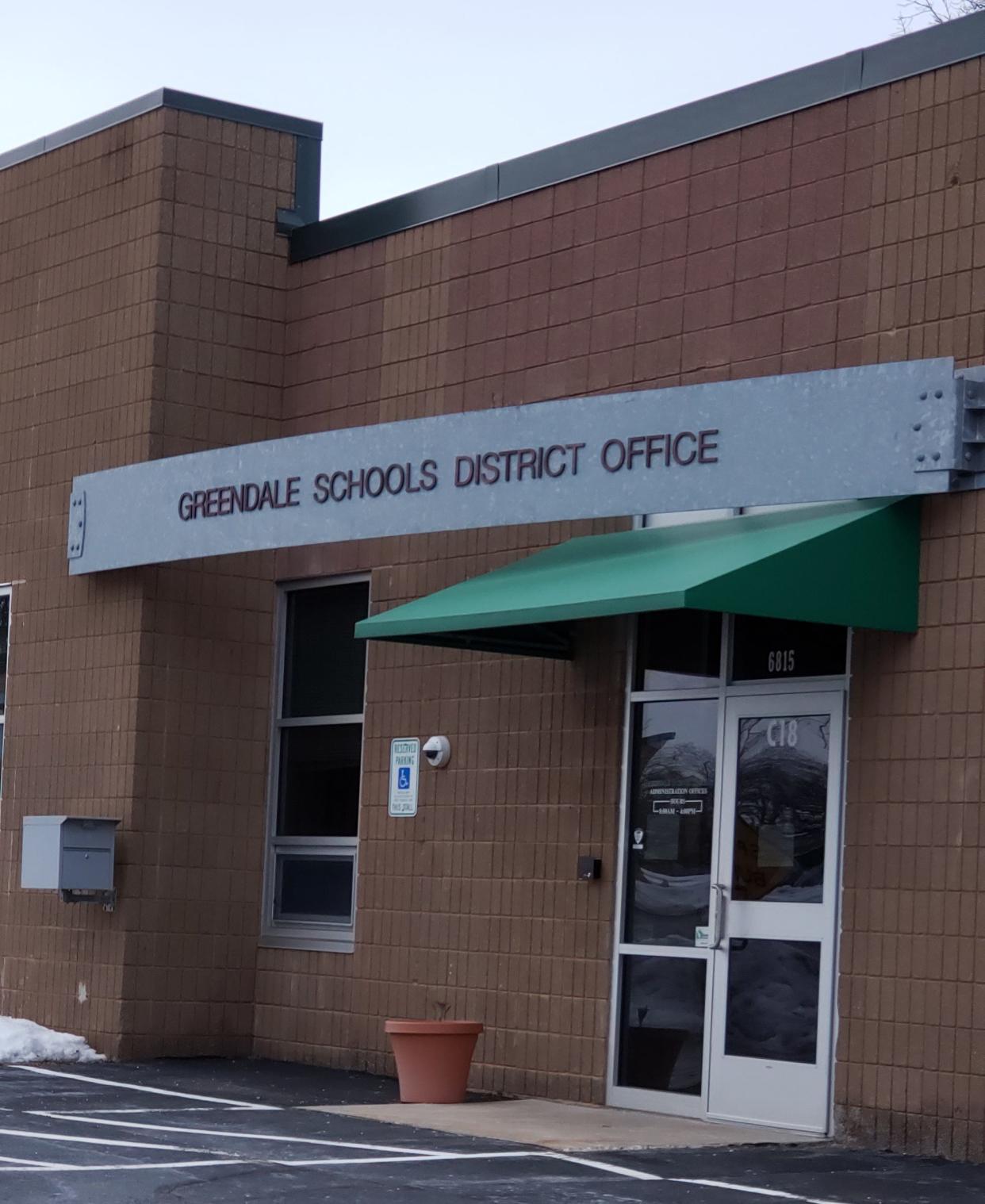 A former student, her mother and a community group have filed a lawsuit against the Greendale School District, alleging that the district isn't living up to an agreement to address racial harassment in its schools.