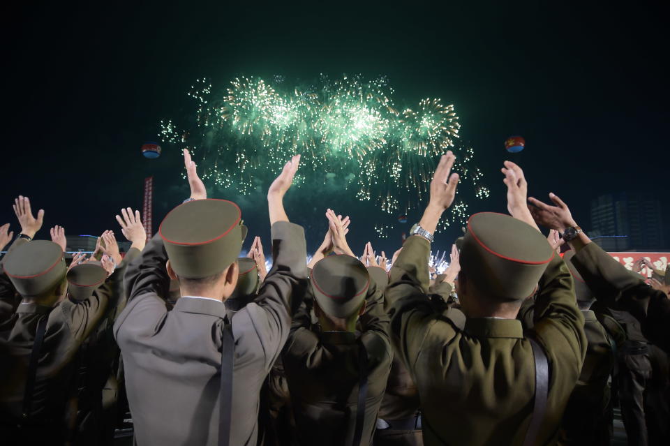 Korean People's Army soldiers cheer during a mass celebration in Pyongyang for scientists involved in developing North Korea's largest nuclear blast to date, Sept. 6, 2017