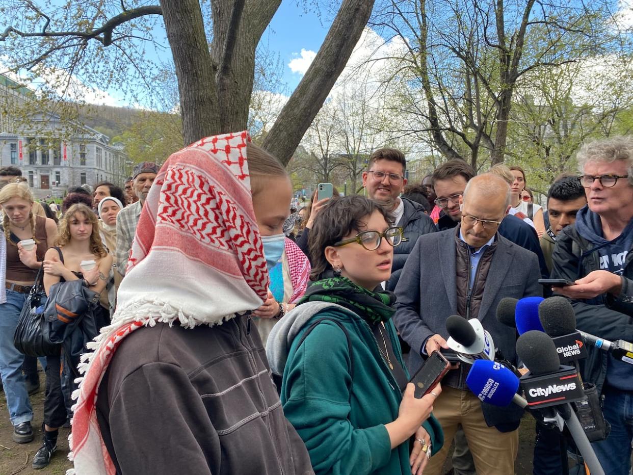 Student protesters at the encampment on McGill University's downtown campus front lawn say they will stay put until further notice.  (Verity Stevenson/CBC - image credit)