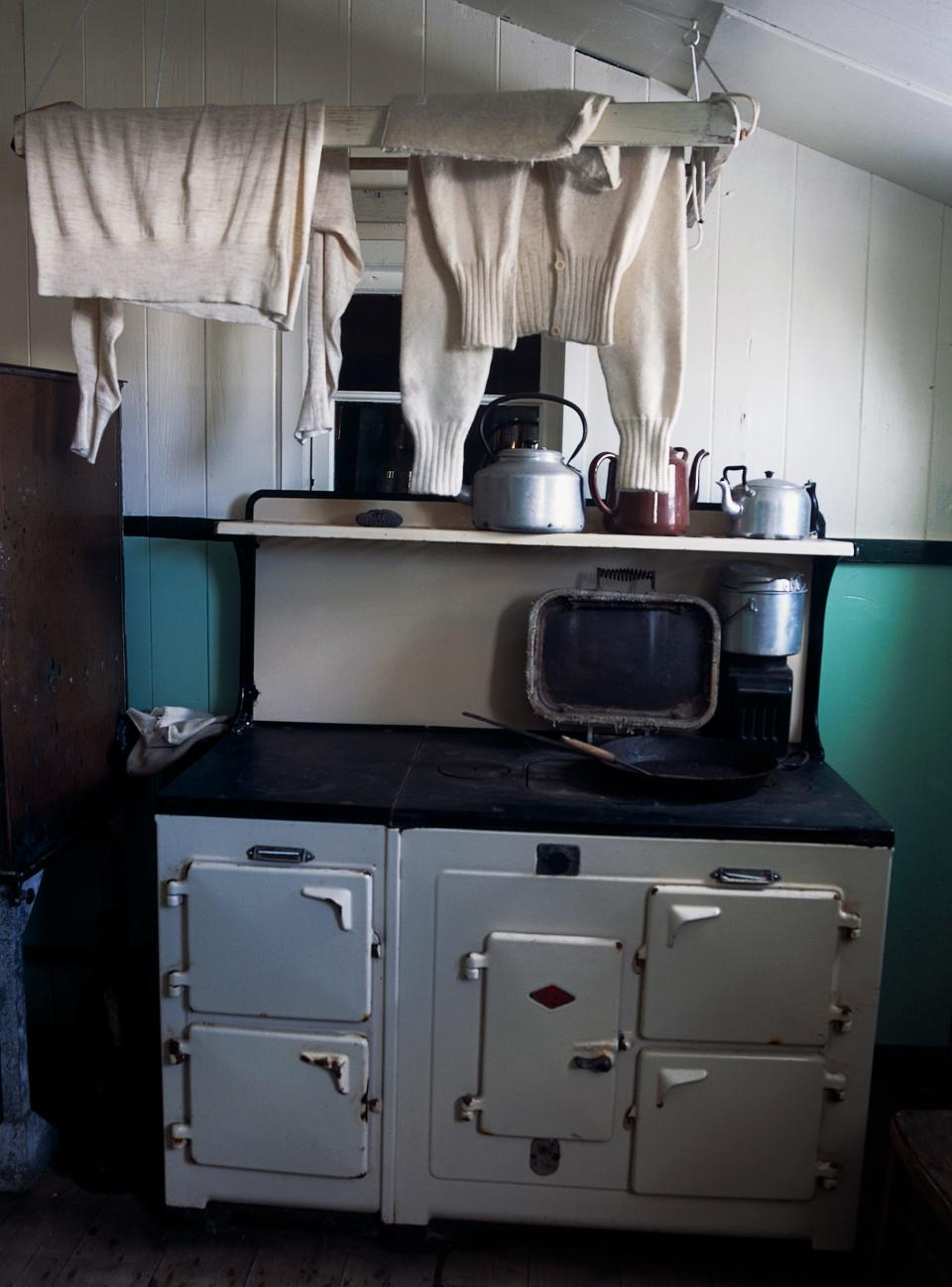 an old-fashioned stove at the museum at the "Penguin Post Office," Port Lockroy on Goudier Island in Antarctica