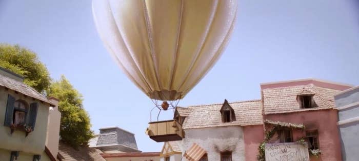 A hot-air balloon floating into the sky