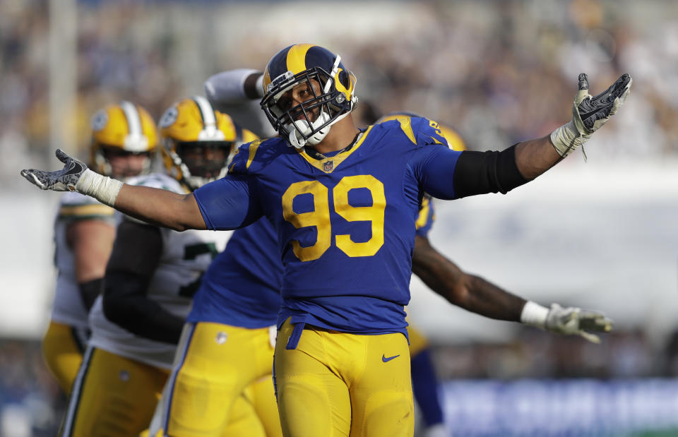 Los Angeles Rams defensive tackle Aaron Donald reacts after sacking Green Bay Packers quarterback Aaron Rodgers during the second half of an NFL football game, Sunday, Oct. 28, 2018, in Los Angeles. (AP Photo/Marcio Jose Sanchez)