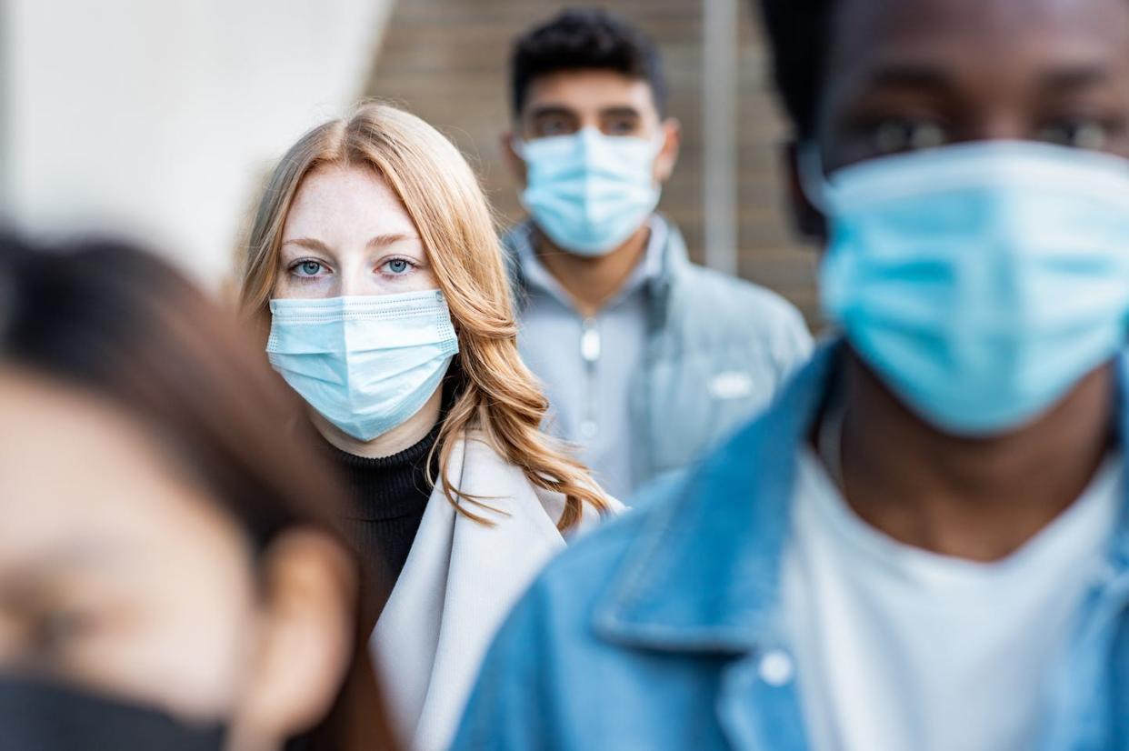 Masks are an easy and low-cost way to reduce the amount of virus entering the air and spreading to others. <a href="https://www.gettyimages.com/detail/photo/multiracial-people-in-the-city-wearing-face-mask-royalty-free-image/1369532854?phrase=masks%20&adppopup=true" rel="nofollow noopener" target="_blank" data-ylk="slk:william87/iStock via Getty Images Plus;elm:context_link;itc:0;sec:content-canvas" class="link ">william87/iStock via Getty Images Plus</a>