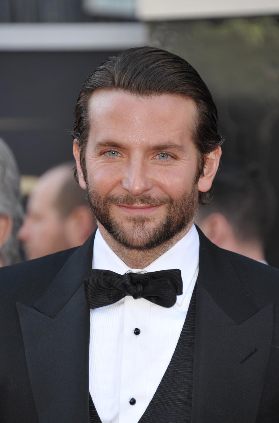 Actor Bradley Cooper arrives at the Oscars at the Dolby Theatre on Sunday Feb. 24, 2013, in Los Angeles. (Photo by John Shearer/Invision/AP)