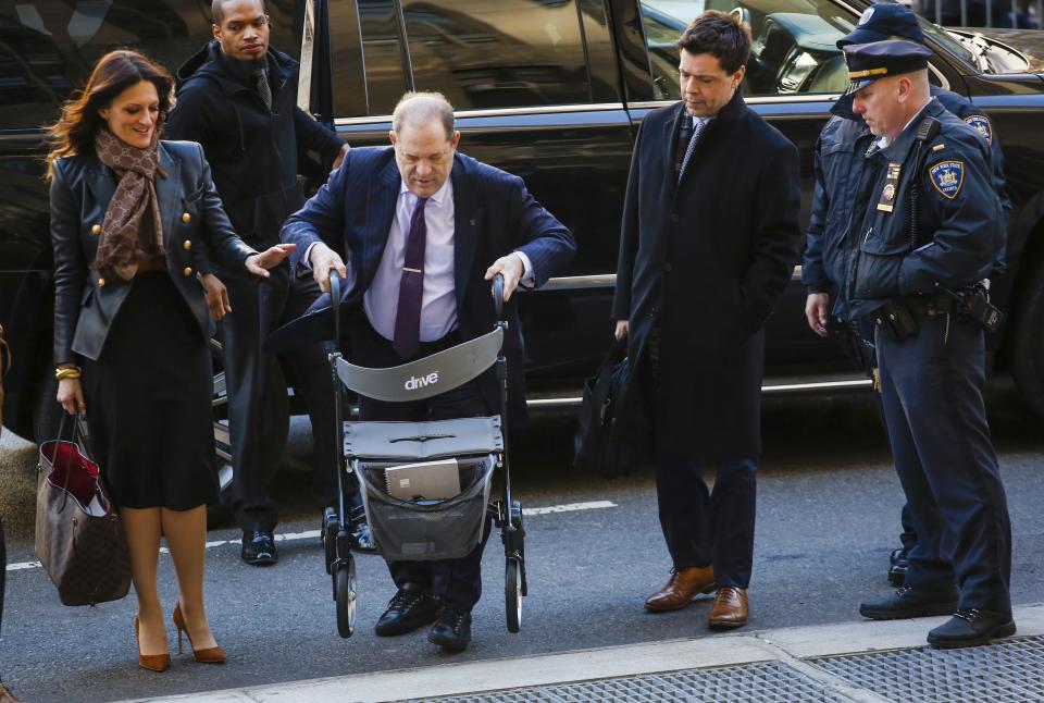 Harvey Weinstein arrives at the courthouse, flanked by lawyers Donna Rotunno and Damon Cheronis, on Feb. 19 in New York City during jury deliberations in his sex crimes trial.