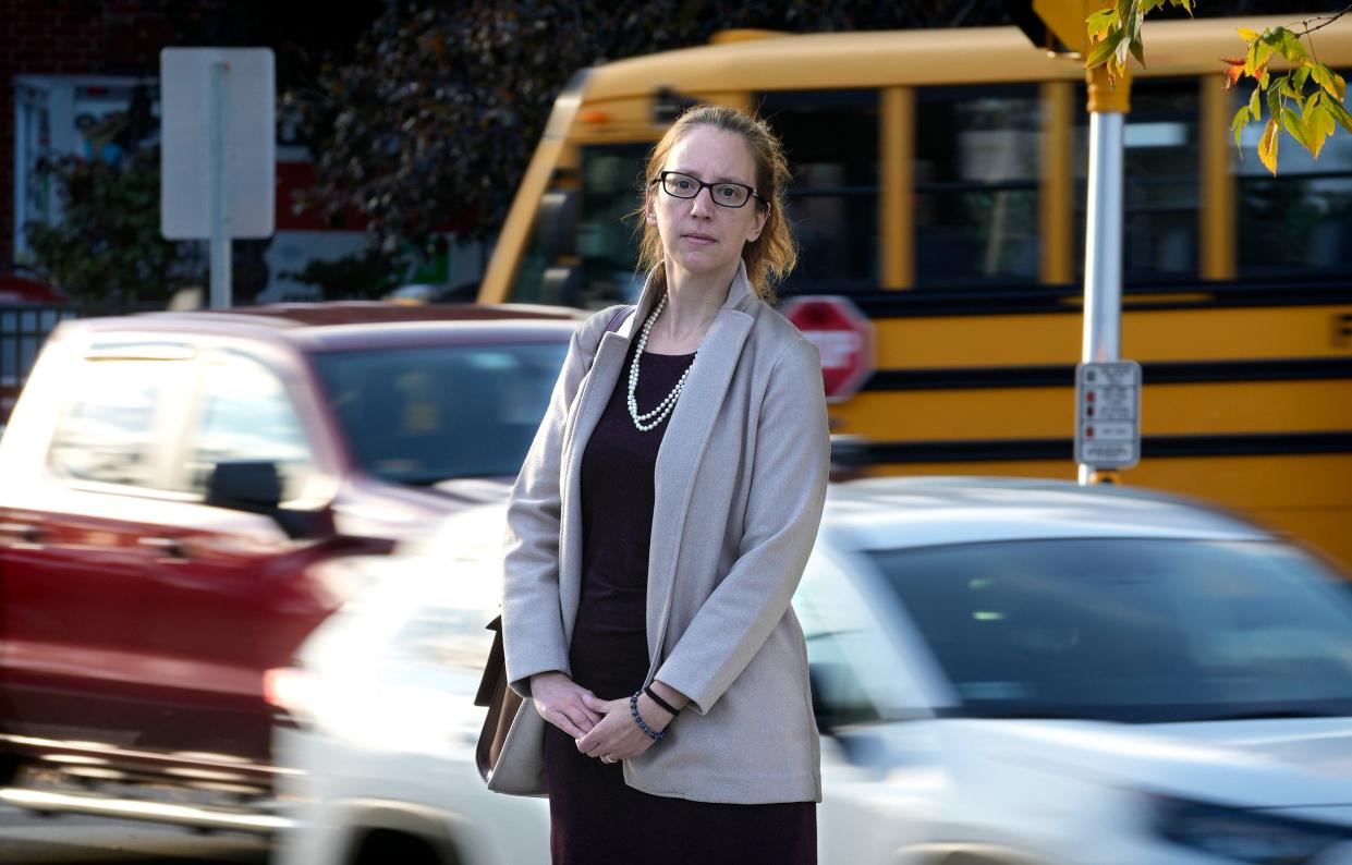 Providence City Council member Sue AnderBois, who heads the North Main Street Task Force, stands at the intersection of North Main and Doyle Avenue, near the spot where a pedestrian was killed in October.