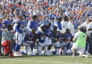 <p>Buffalo Bills players kneel in protest during the National Anthem before a game against the Denver Broncos at New Era Field. Mandatory Credit: Timothy T. Ludwig-USA TODAY Sports </p>