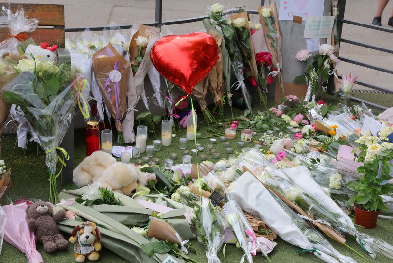 Tribute for victims the day after knife attack in French alpine town of Annecy