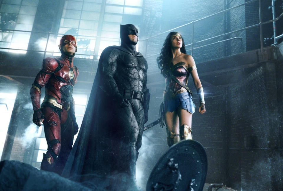 Ezra Miller as the Flash, with Ben Affleck's Batman and Gal Gadot's Wonder Woman in 'Justice League' (credit: Warner Bros)