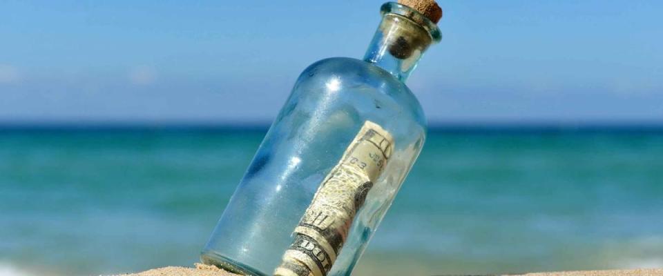Bottle with ten dollars bill inside found on the beach
